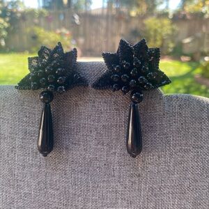 Black dangle pierced earrings with beads and sequins. Approximately 2-1/2” long.